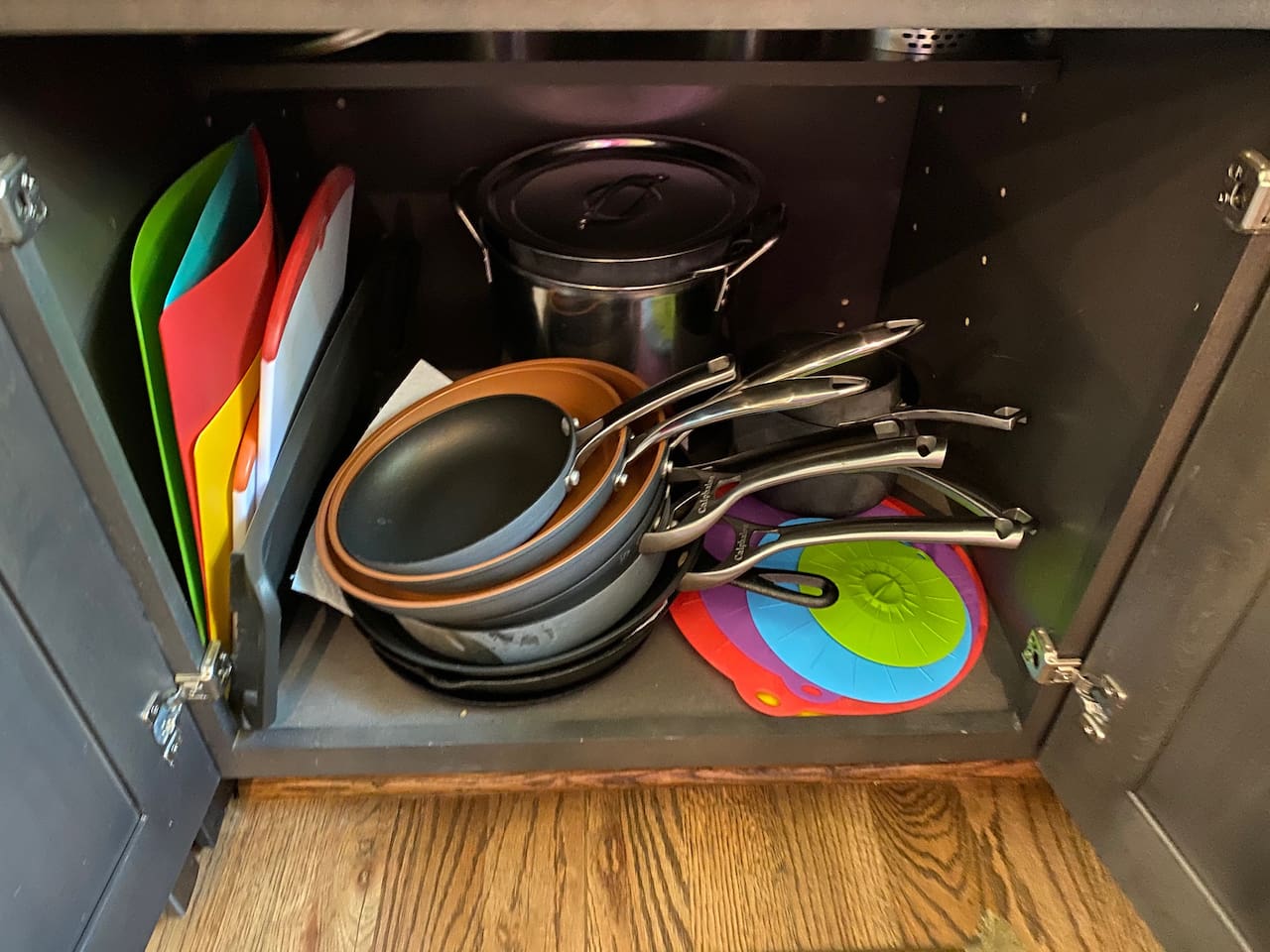 Pots and pans along w/skillets to cook with and cutting boards.