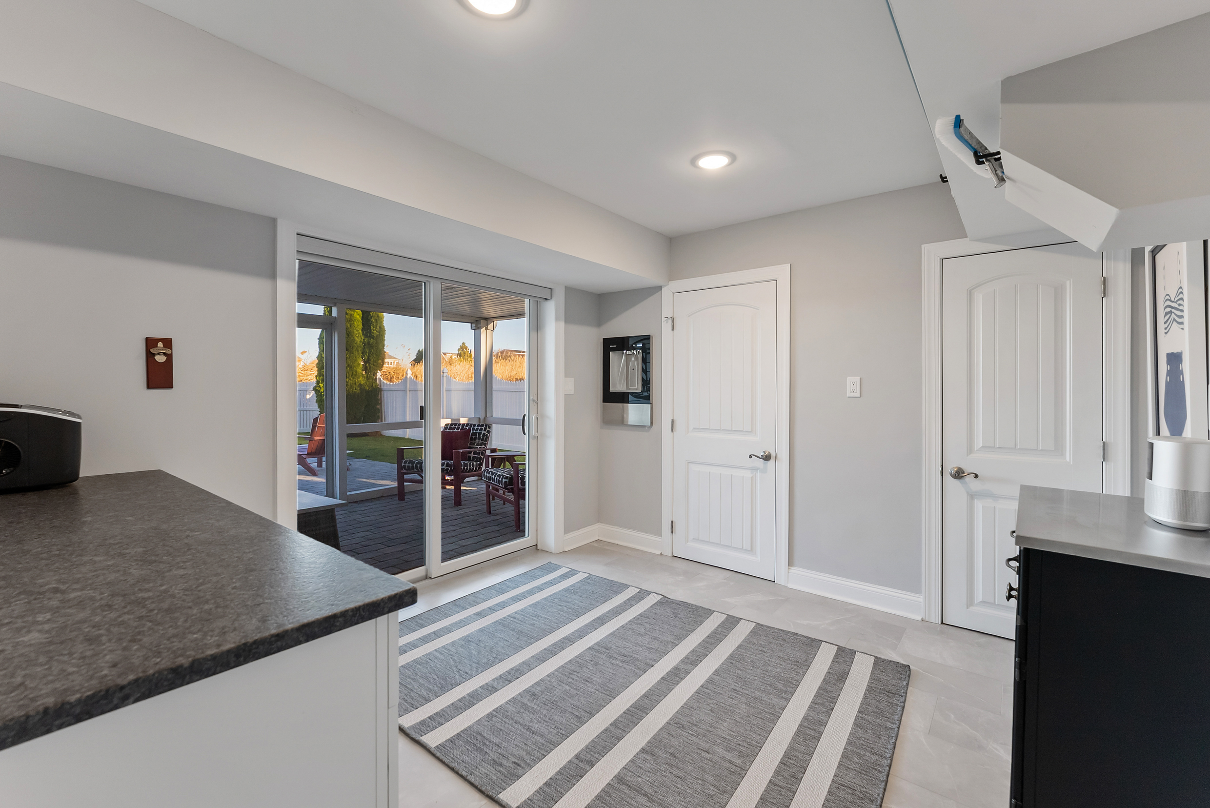 Yoga/Lounge Room with In Wall Water Fountain and Beverage Fridge
