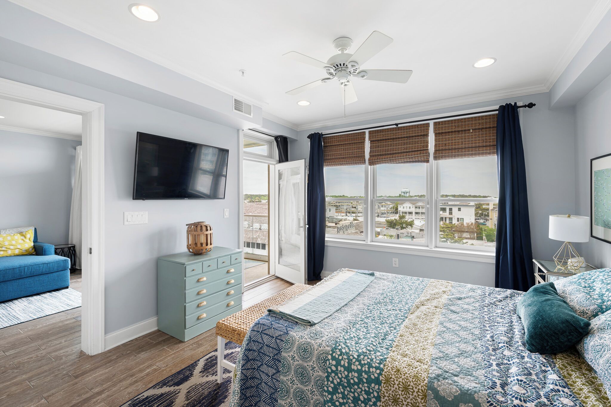 Primary bedroom with access to balcony