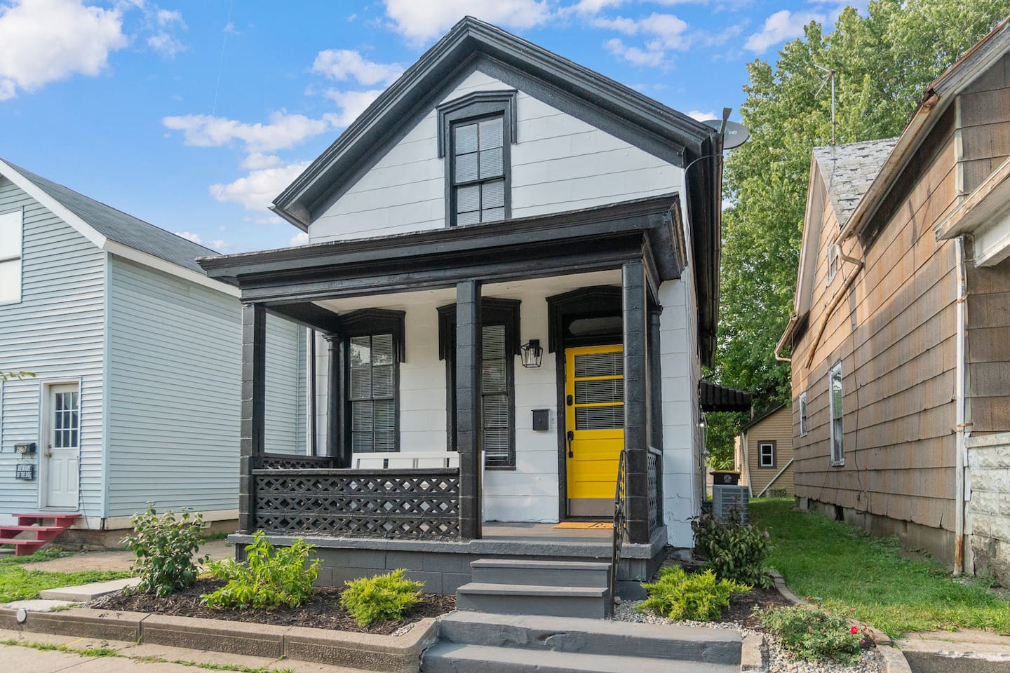 Charming front exterior of the house, featuring a welcoming entrance, well-kept landscaping, and a warm, inviting atmosphere that sets the tone for the entire property.