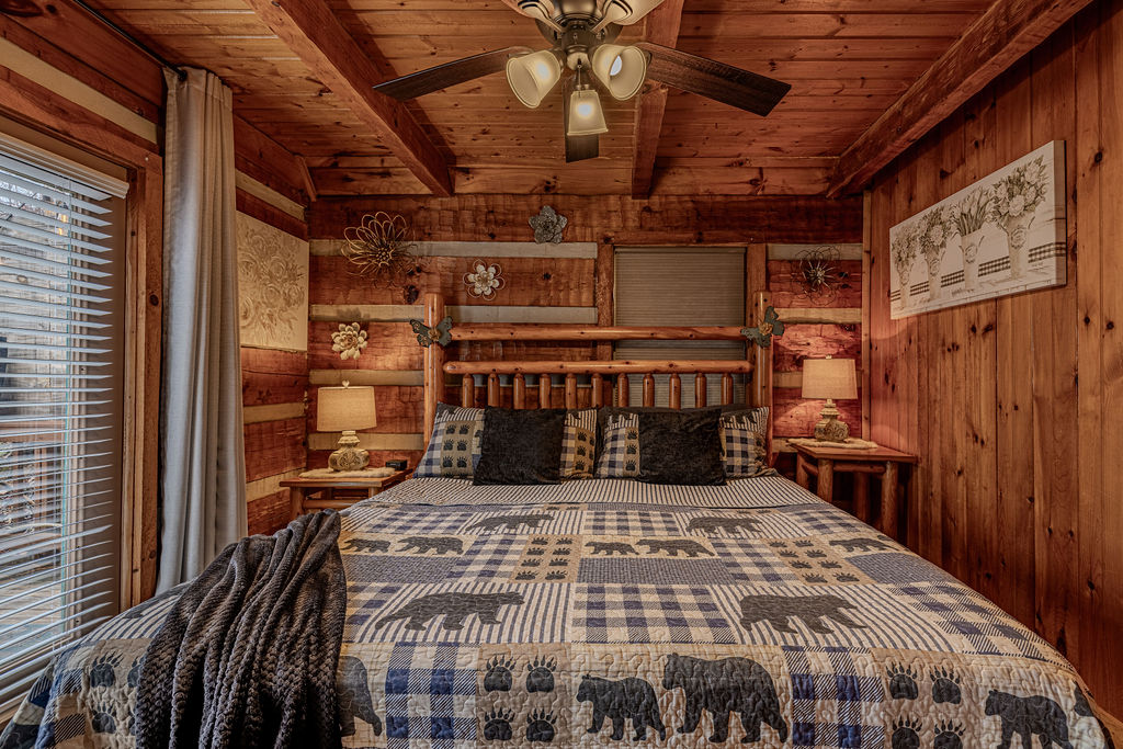 King bed with vaulted ceilings and mountain views