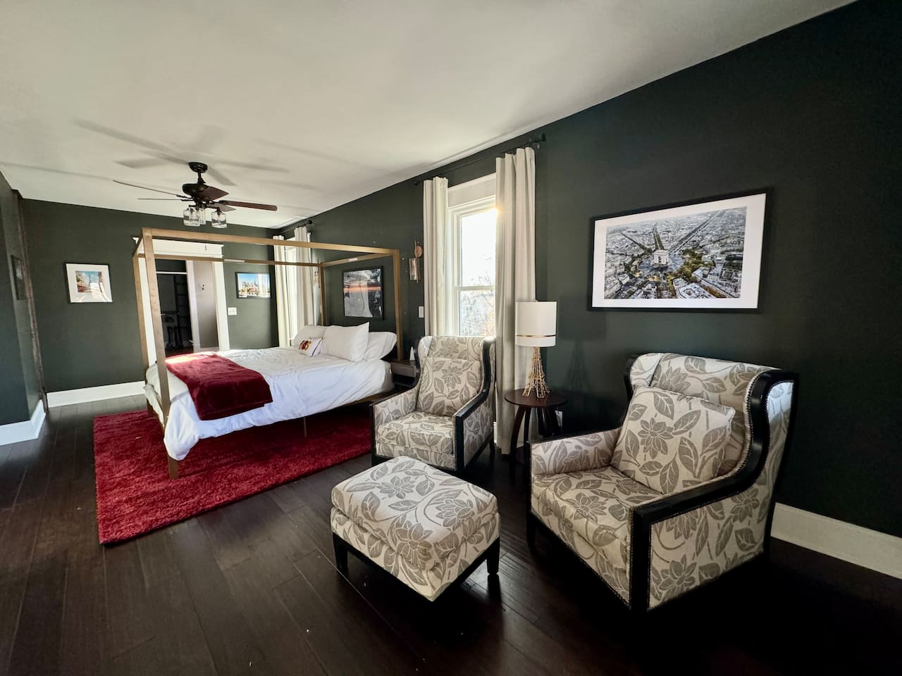 The Upper Level Paris Suite offers a King Bed, sitting area, ensuite bathroom and even partial views of the lake.