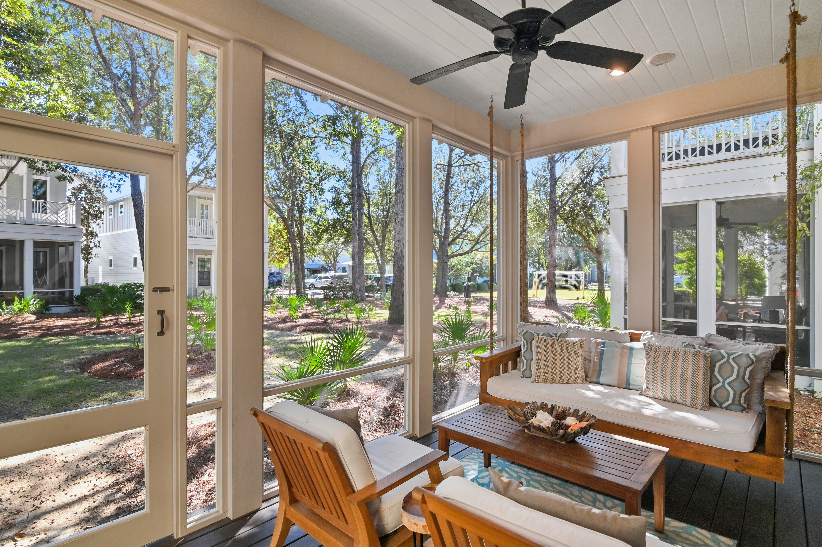 Screened Porch Overlooking the Green – Morning Coffee & Evening Relaxation
