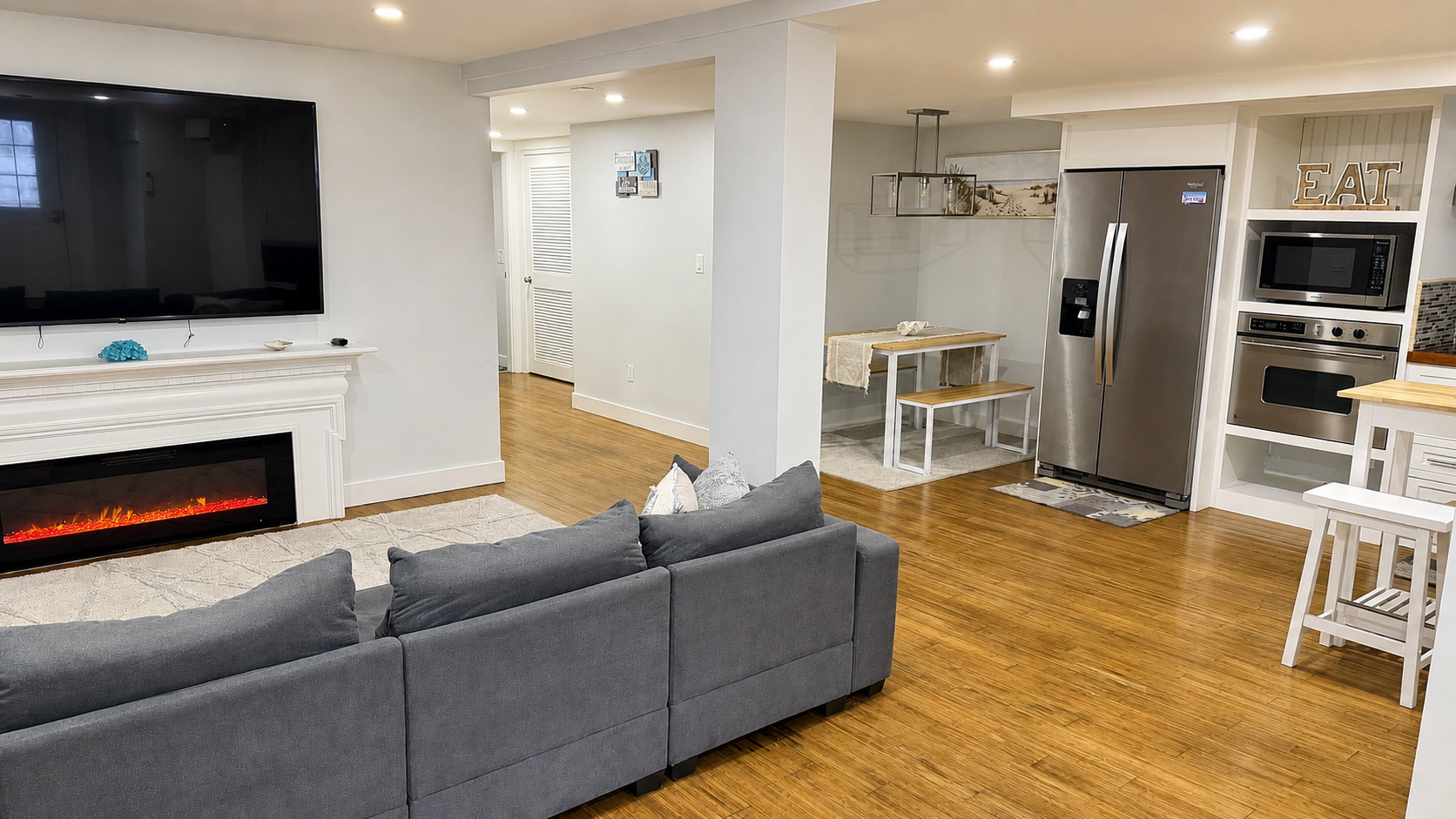 Basement living area with second kitchen and dining nook