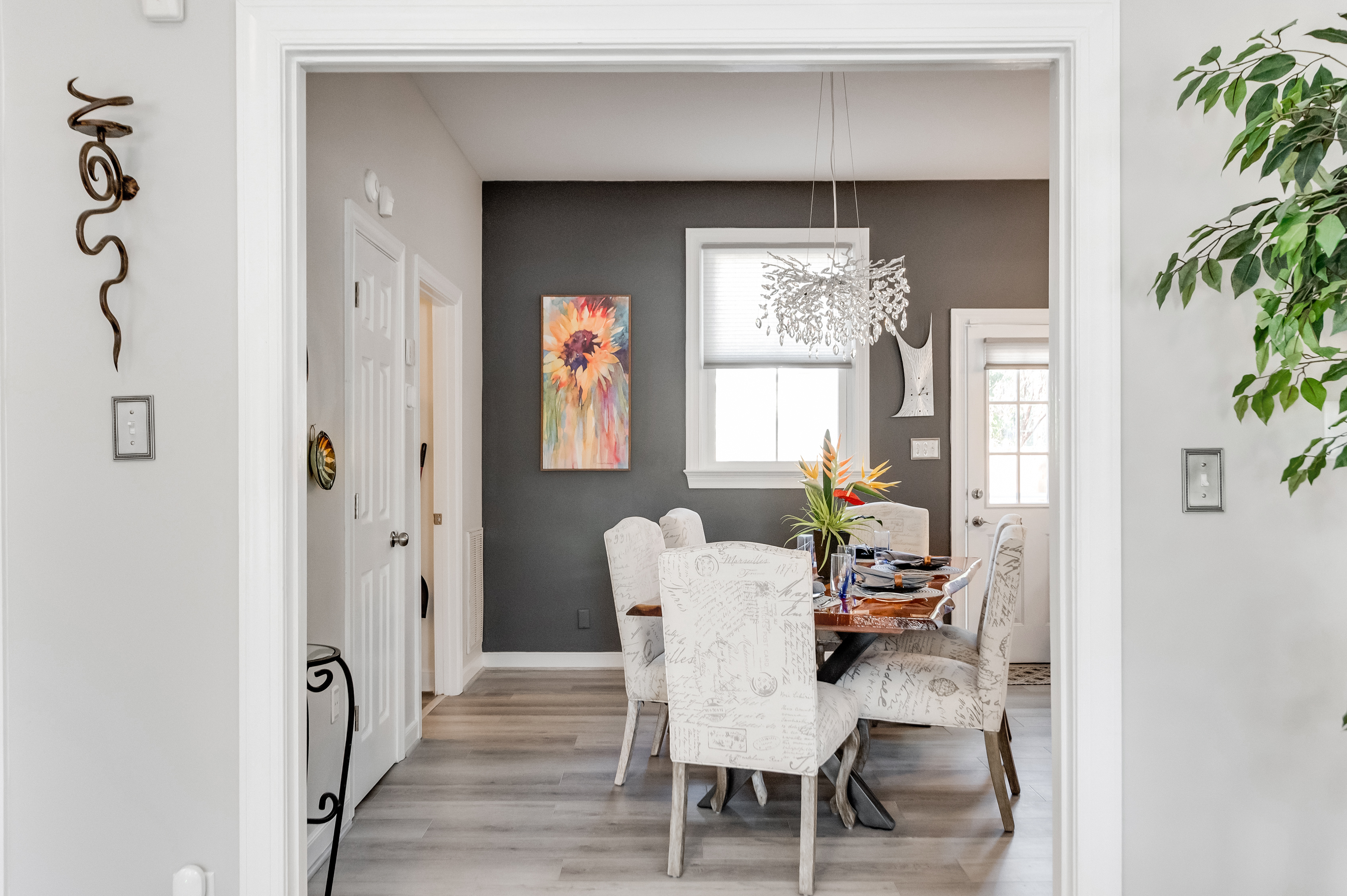 Dining Room: Enjoy vibrant meals surrounded by art and chic decor in this inviting space!