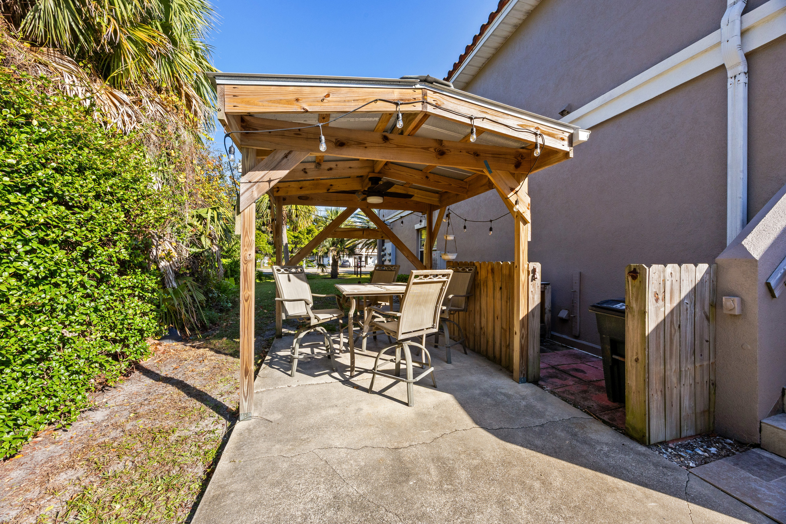 Covered patio area with shaded sitting space
