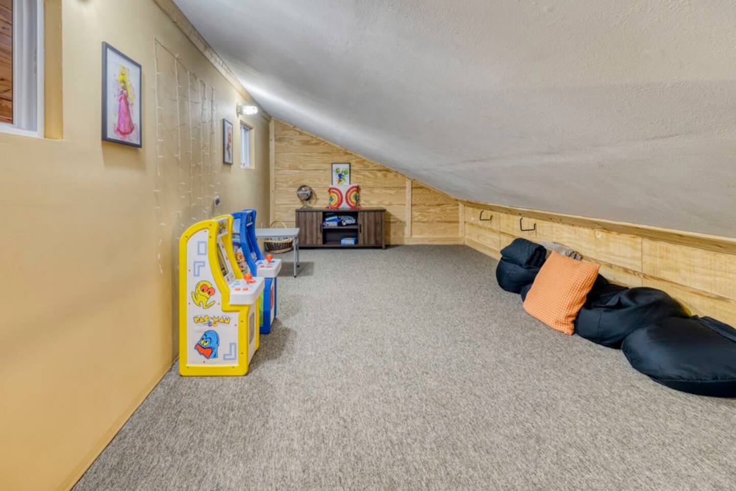 Discover the kids' playroom situated above the game room.