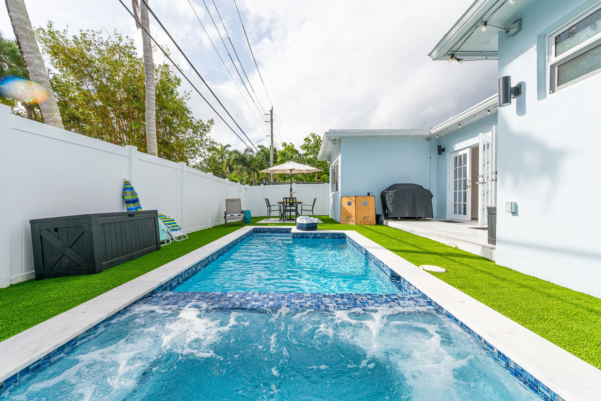 Enjoy your own private pool and hot tub, gas fire pit lounge, outdoor dining, and games—ideal for families and groups seeking a fun Florida escape.