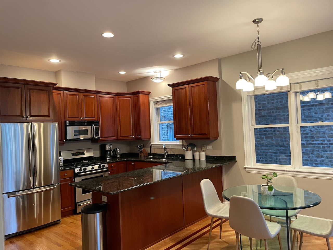 Modern kitchen layout with planty of prep space and storage for group stays