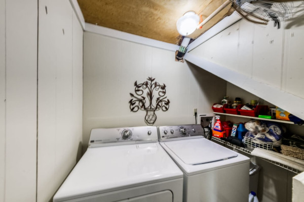 Conveniently located on the first level, the full laundry room is equipped with everything you need for a hassle-free stay!