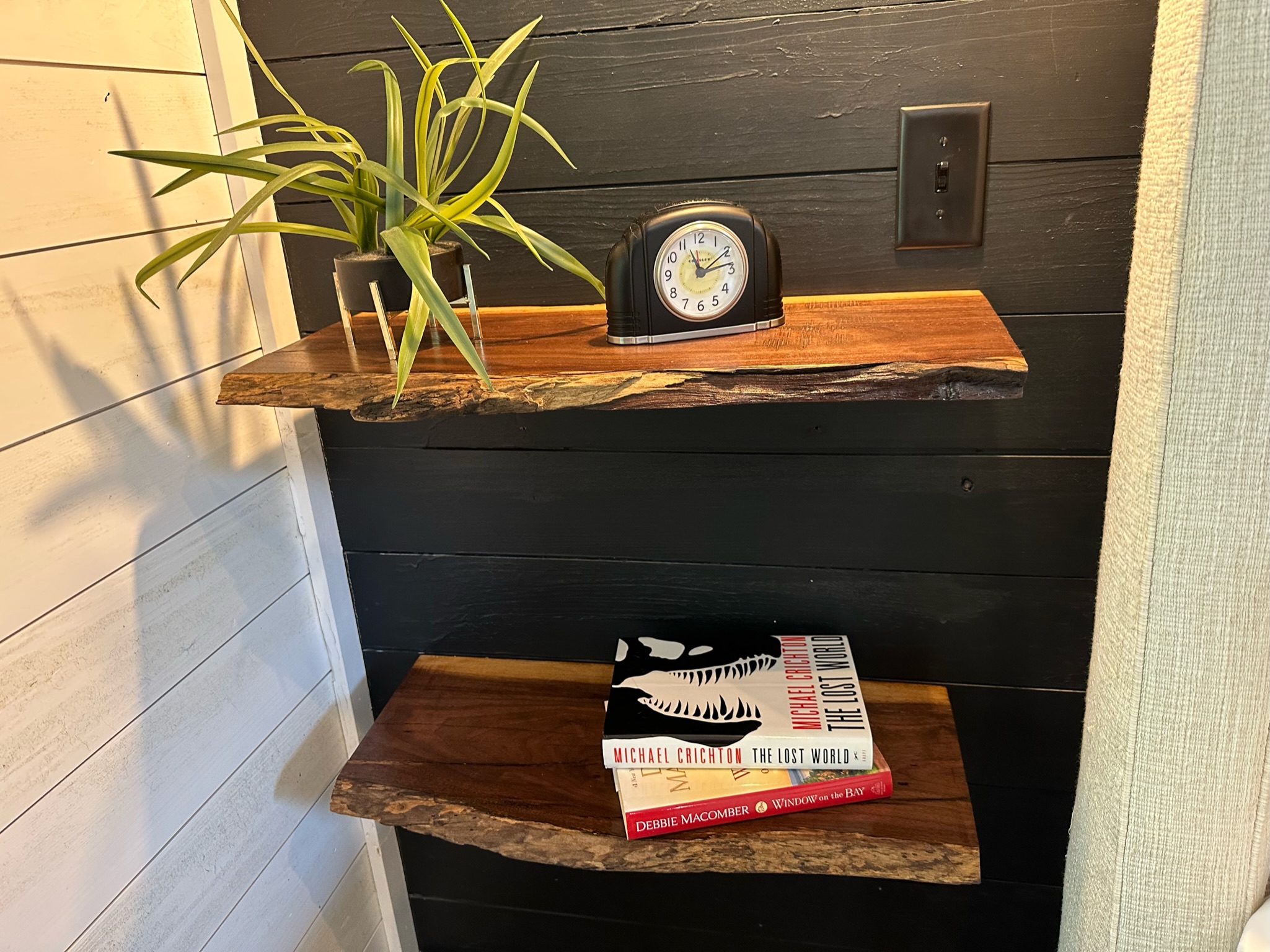 Hand crafted Live Edge Black Walnut night stand shelves in the master bedroom!
