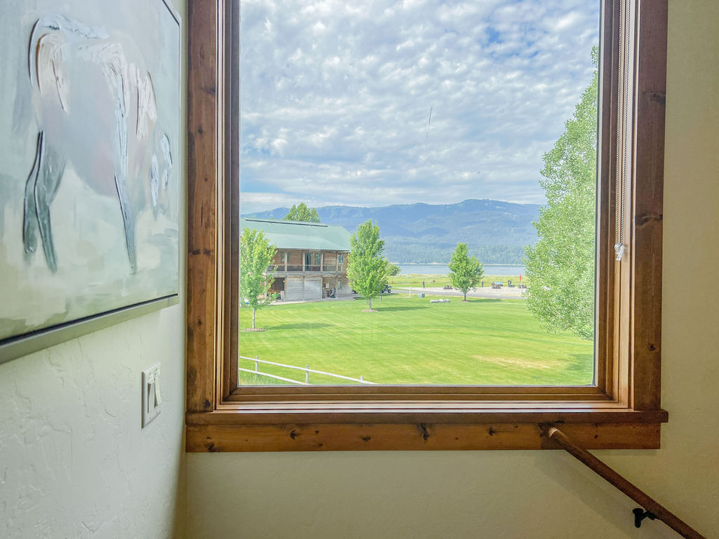 Every upstairs space boasts of view of the mountains and/or the Palisades Reservoir .