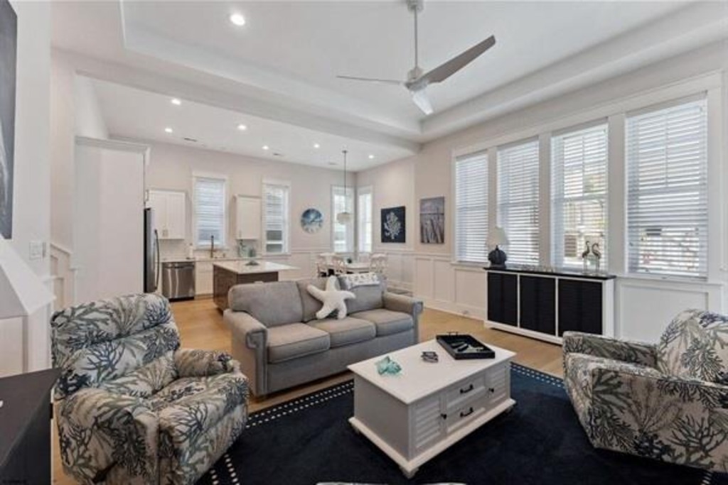 Spacious living room with lush seating