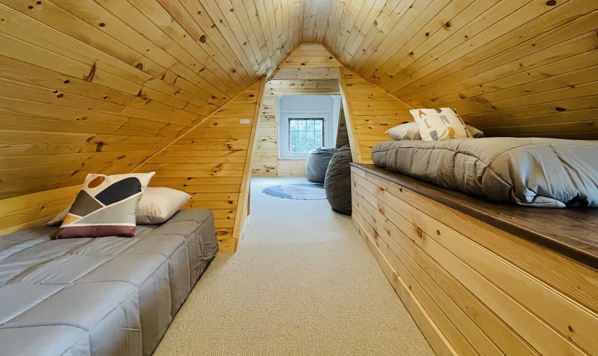 Twin beds off of the TV area