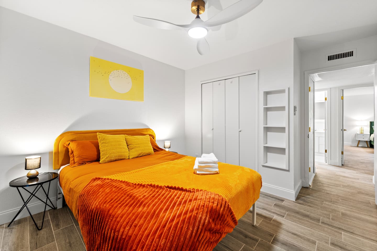 Flooded with natural light, this bright and airy bedroom is designed for comfort and peace.