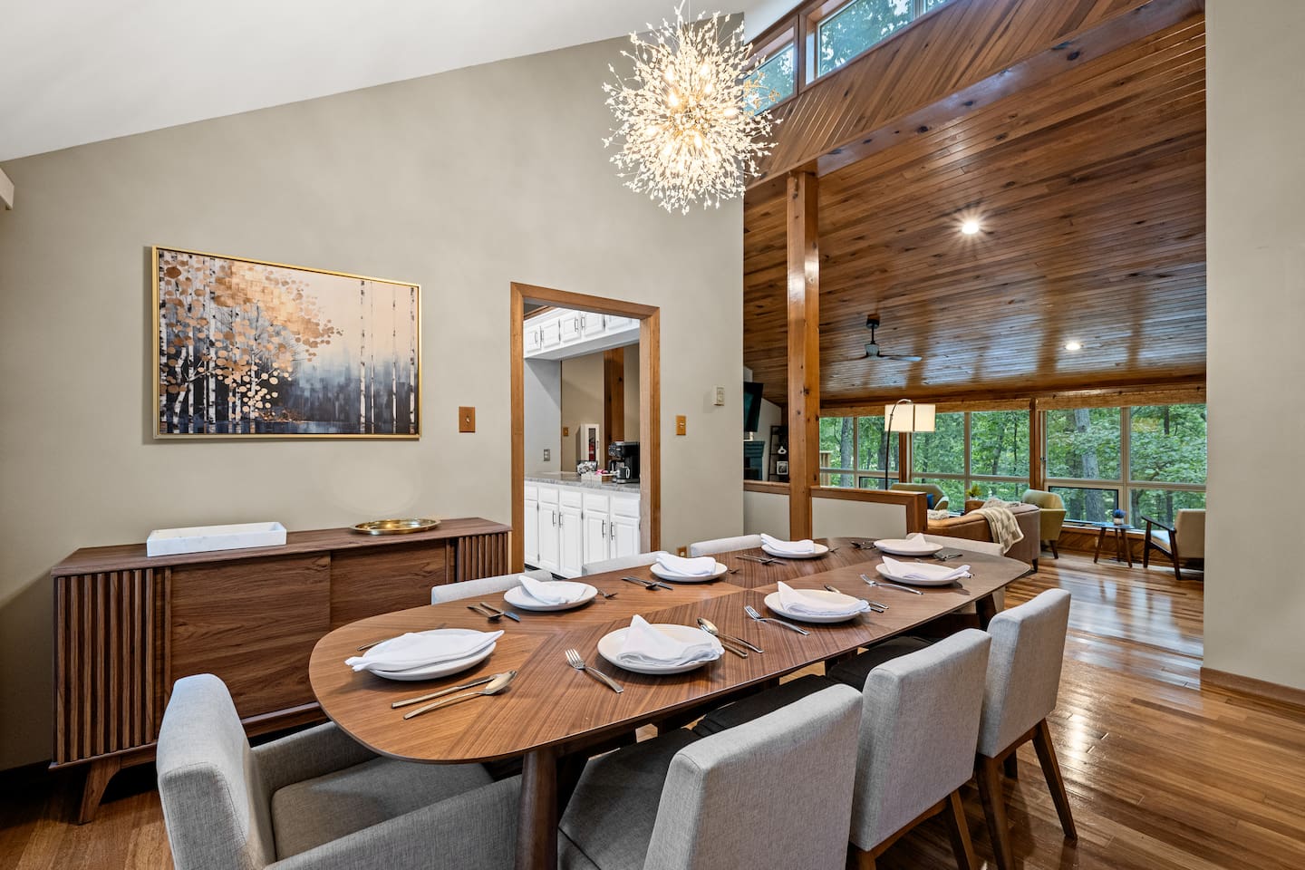 Seating for eight at the dinner table.  24 sets of flatware and dishes for larger groups.