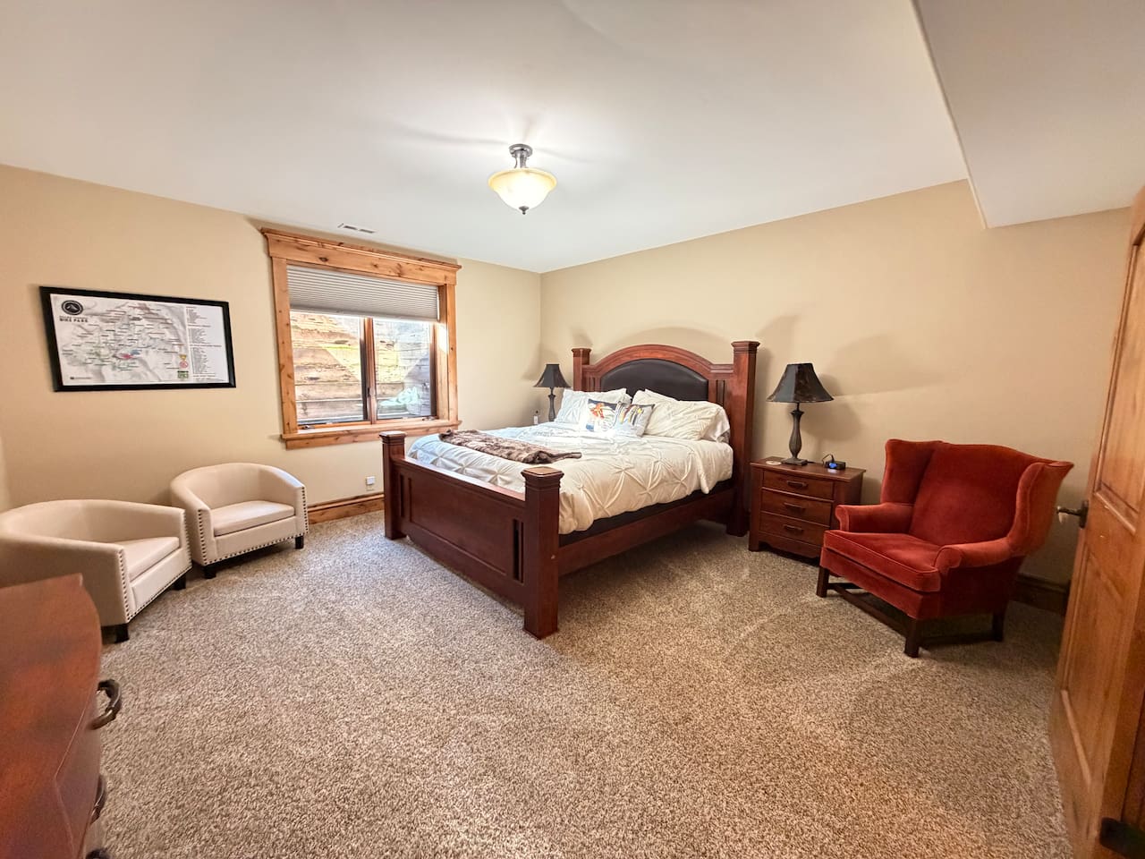 Our bedrooms are designed with comfort and relaxation in mind, featuring soothing décor and a cozy atmosphere to help you recharge after a day of adventure. Bedroom 3 boasts a king bed on the lower level, with easy access to the nearby bathroom