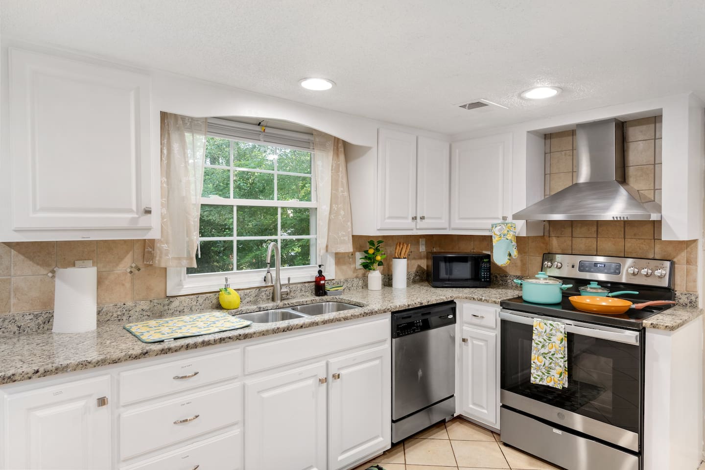 This kitchen combines modern functionality with charming finishes, making mealtime feel like home.