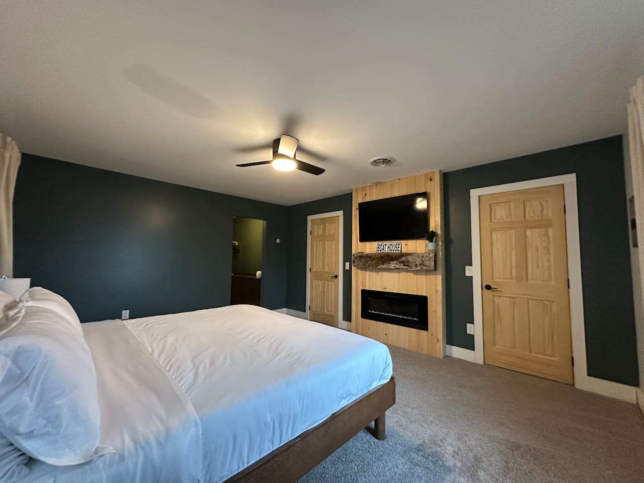 Newly redesigned primary bedroom w/ WIC and en suite bathroom.