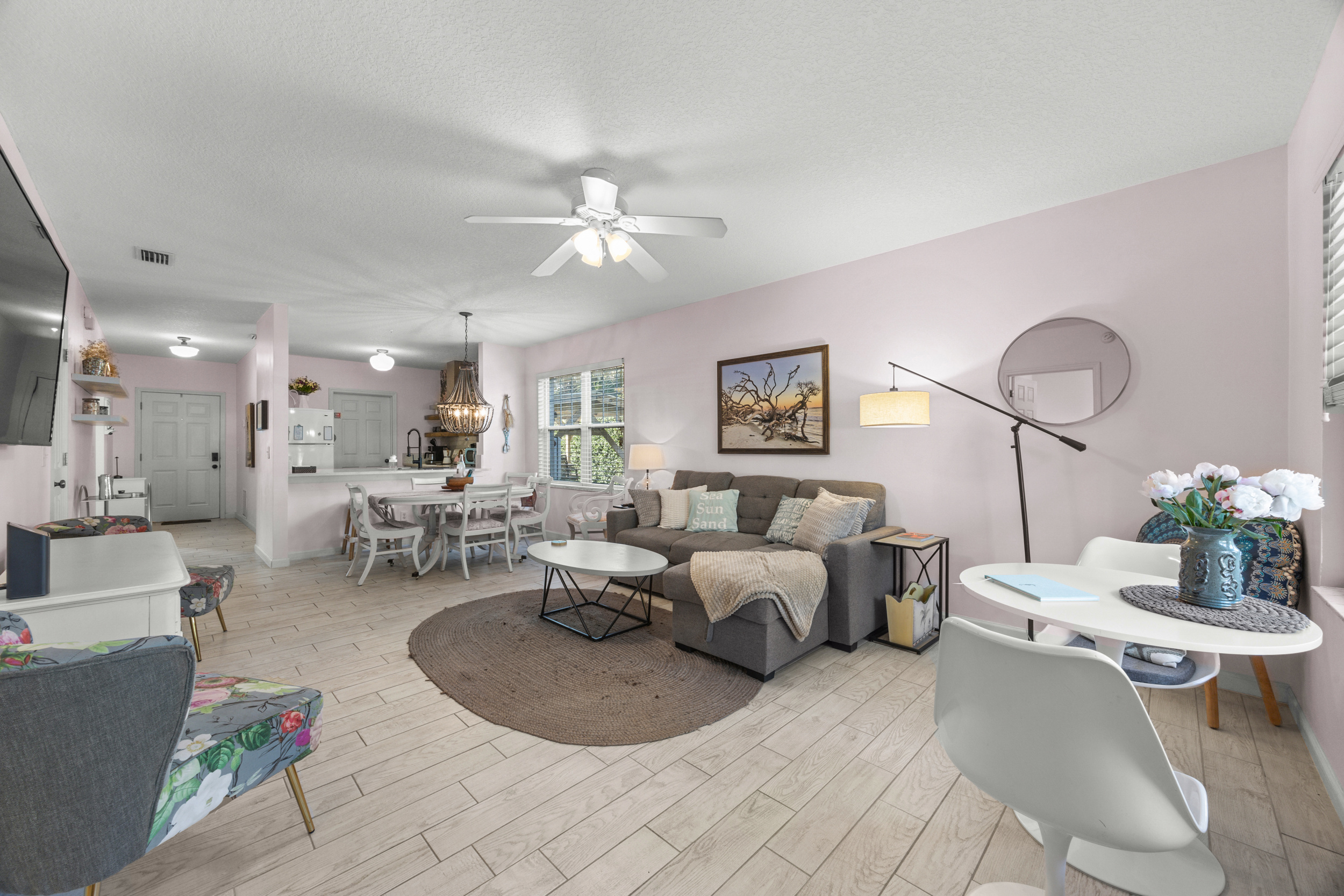 Cozy living area with modern décor and a spacious layout ideal for gathering with family and friends.