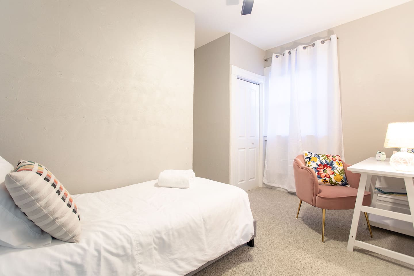 Enjoy the second floor’s cozy Twin Room with twin bed and bedside table with lamp.