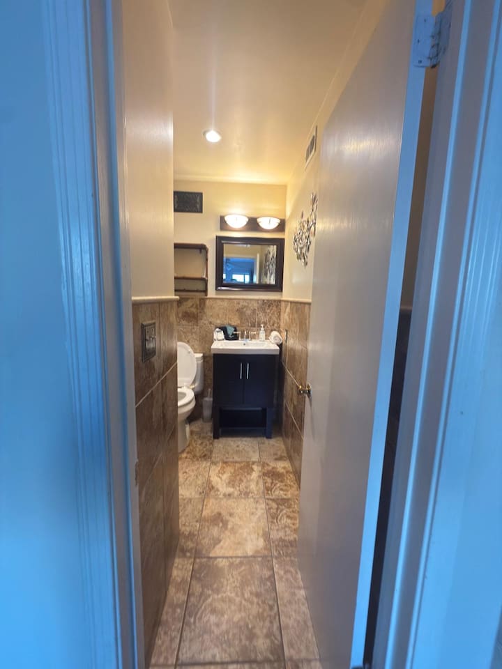Bathroom with tiled walls