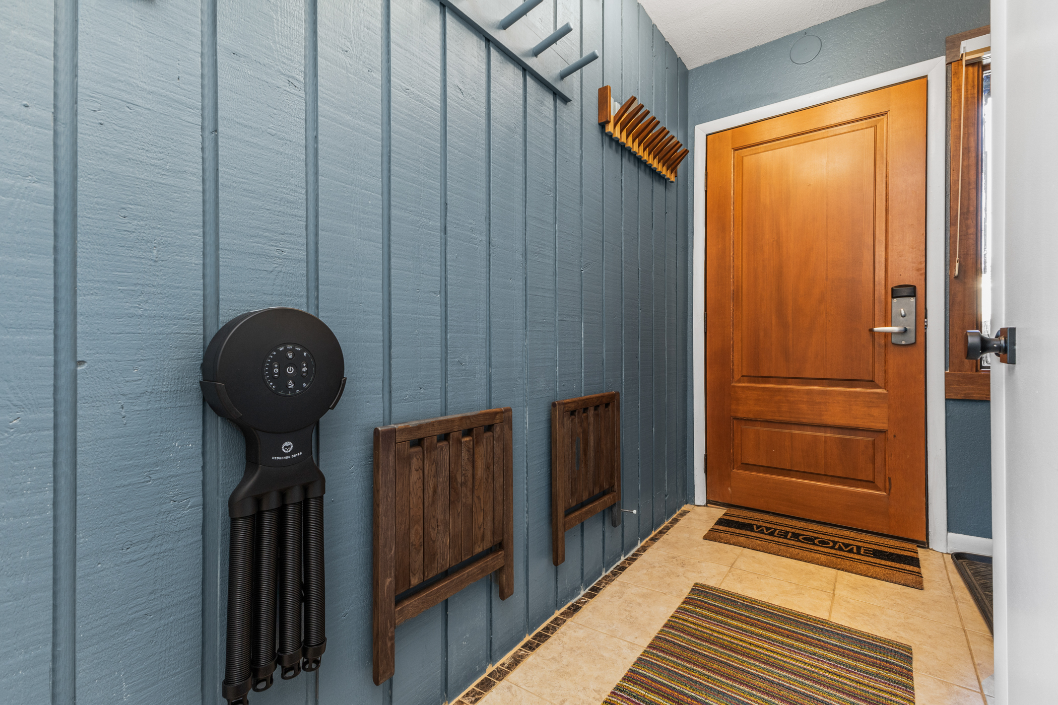 Entryway with Boot Dryer & Fold Out Chairs