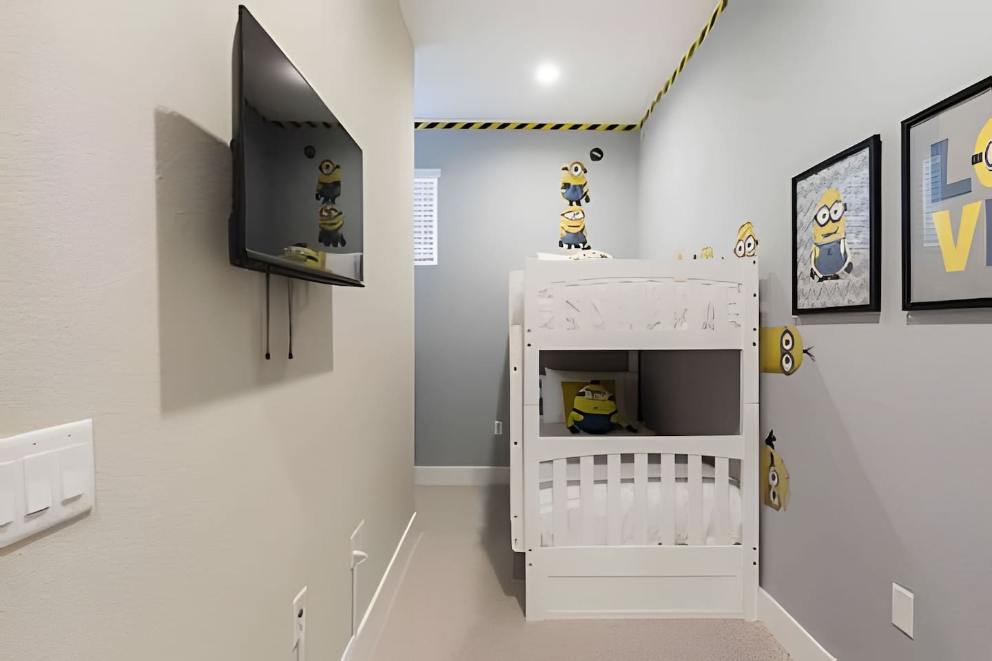Fun room with bunk beds, a dresser, and TV. Perfect for kids or groups.