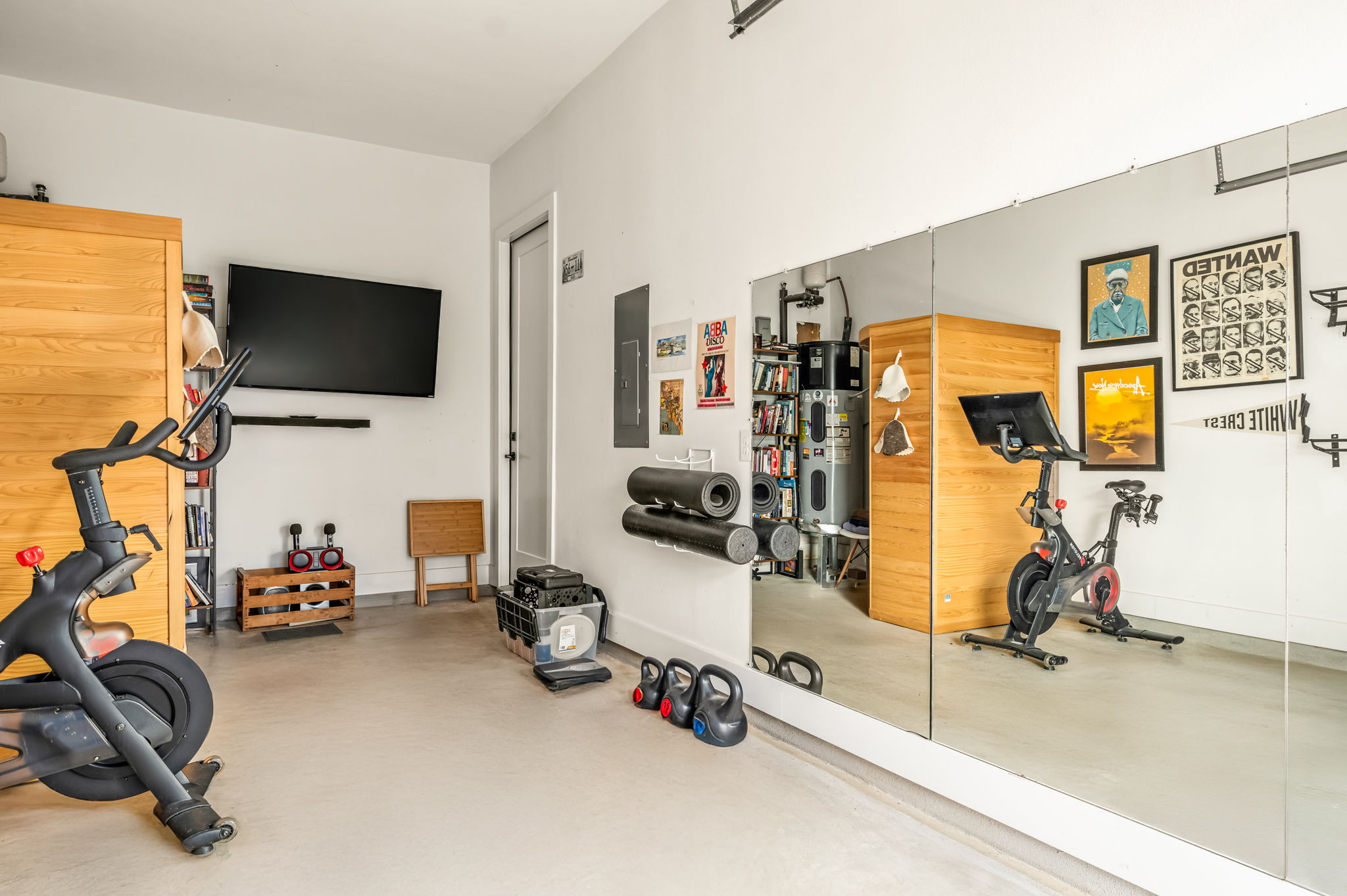 Bright and inviting workout space with mirrors and fitness essentials
