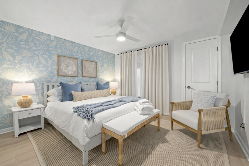Unwind in breezy coastal comfort, where soft blues, warm textures, and serene details come together for the perfect relaxing retreat by the shore.