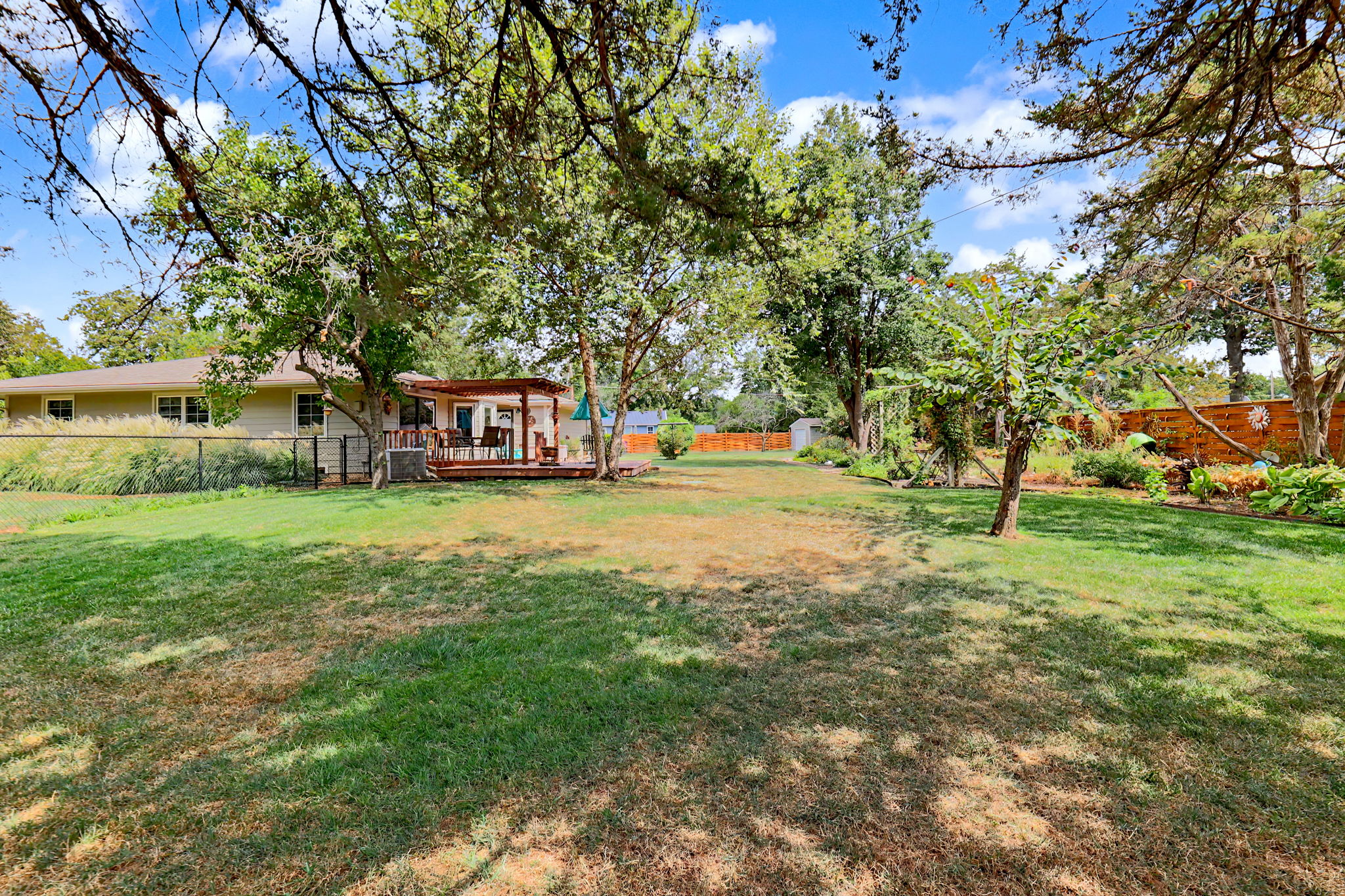 1/2 Acre fenced in backyard
