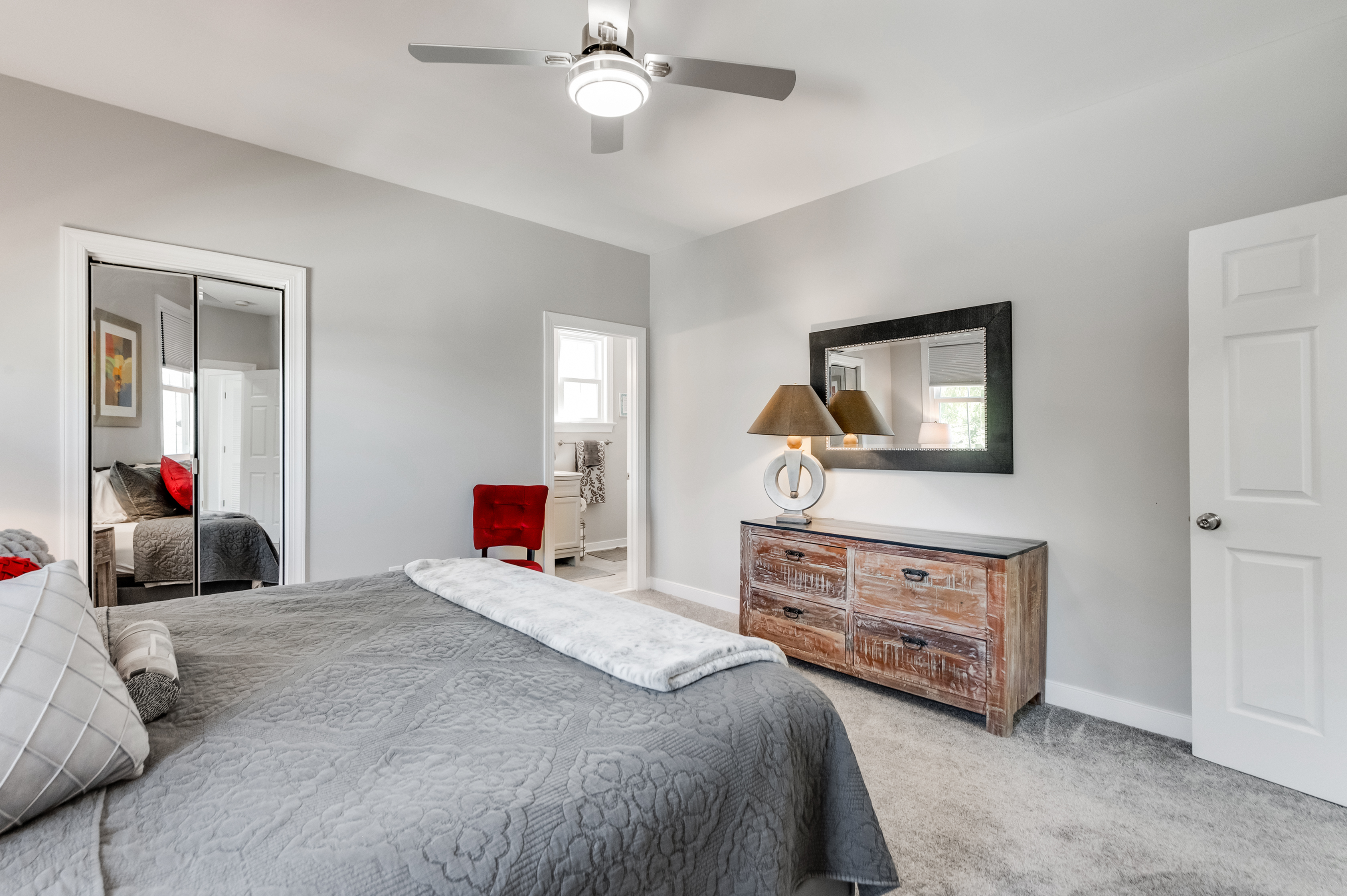 King Bedroom 1: Relax in this stylish room with chic decor and elegant lighting!