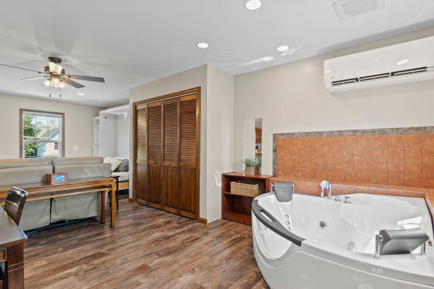 Another relaxing space in the house featuring an indoor jacuzzi, perfect for unwinding and enjoying a spa-like experience.