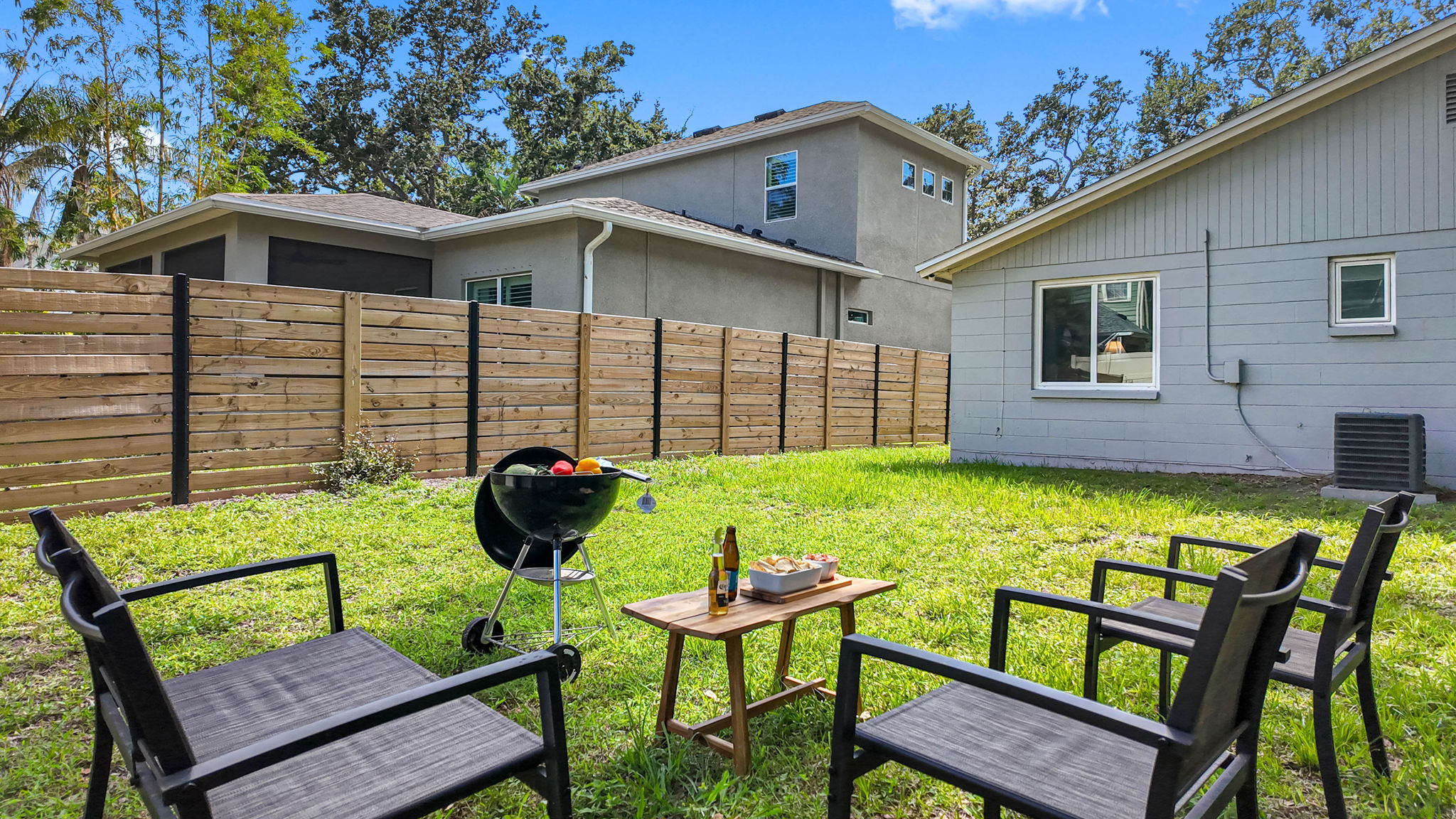 This fully fenced backyard is the perfect space to relax, grill, and unwind in total privacy.