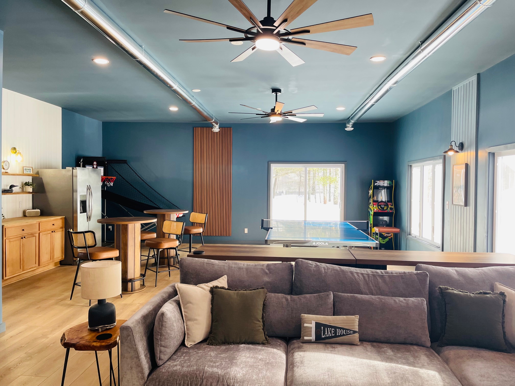 Cozy seating area with large sectional and power recliner