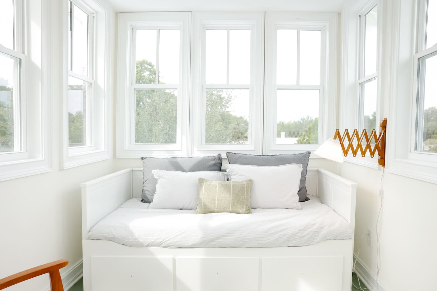 The lookout is surrounded by windows for views of the historic downtown neighborhood. The day bed pulls out into two twin mattresses. 