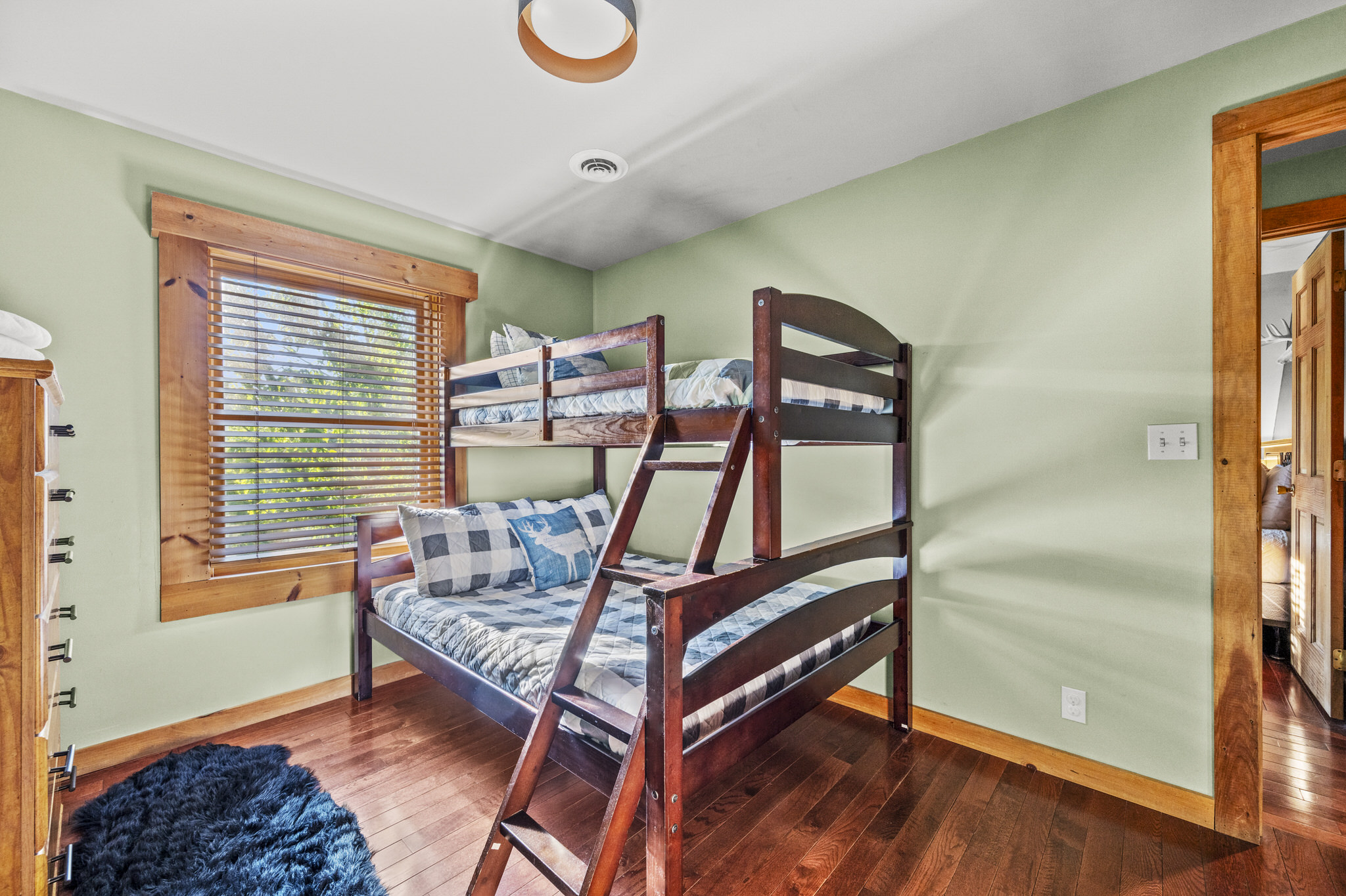 Fun and functional upstairs bunk room for kids or friends.