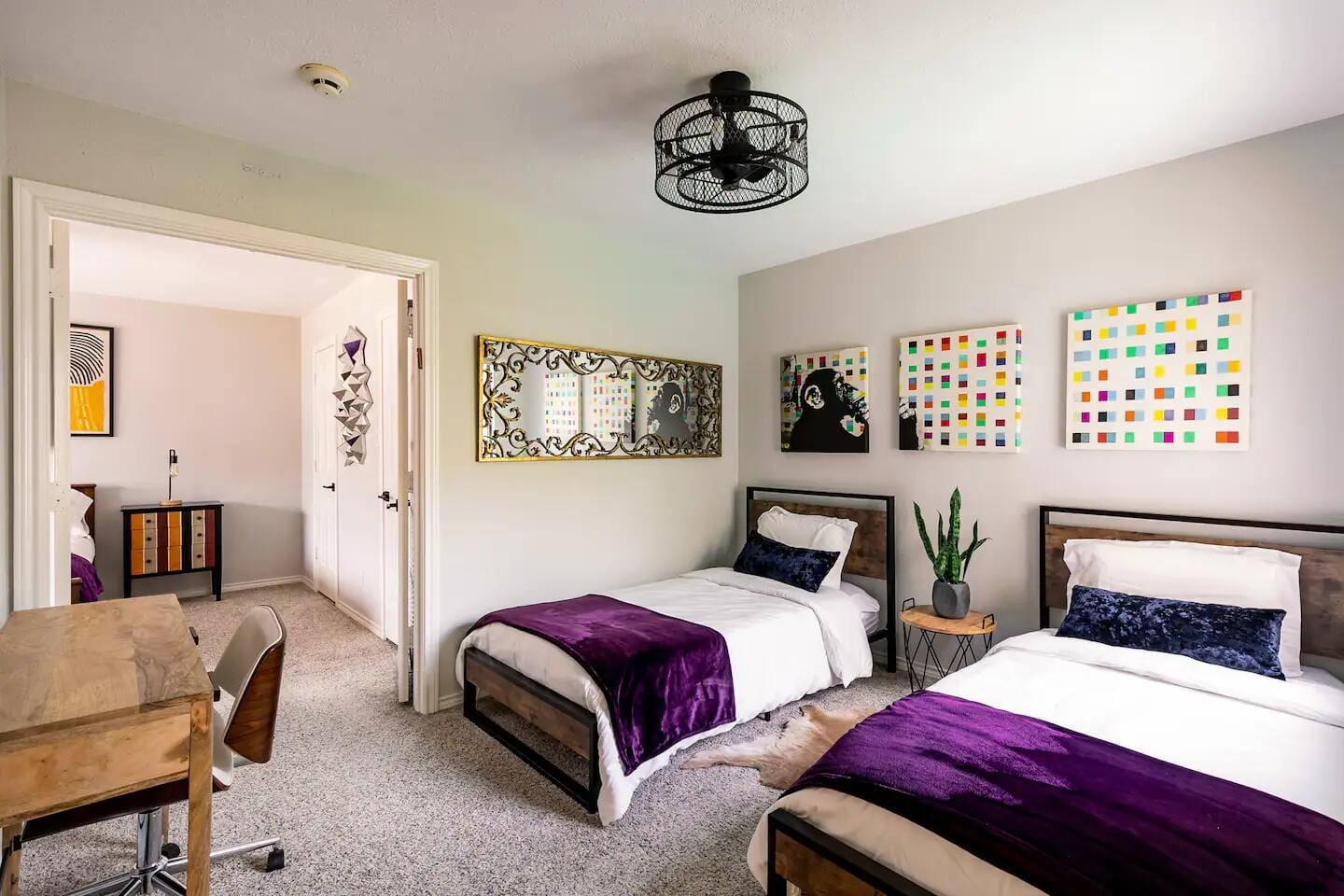 Guest bedroom with two twin beds and cheerful décor.