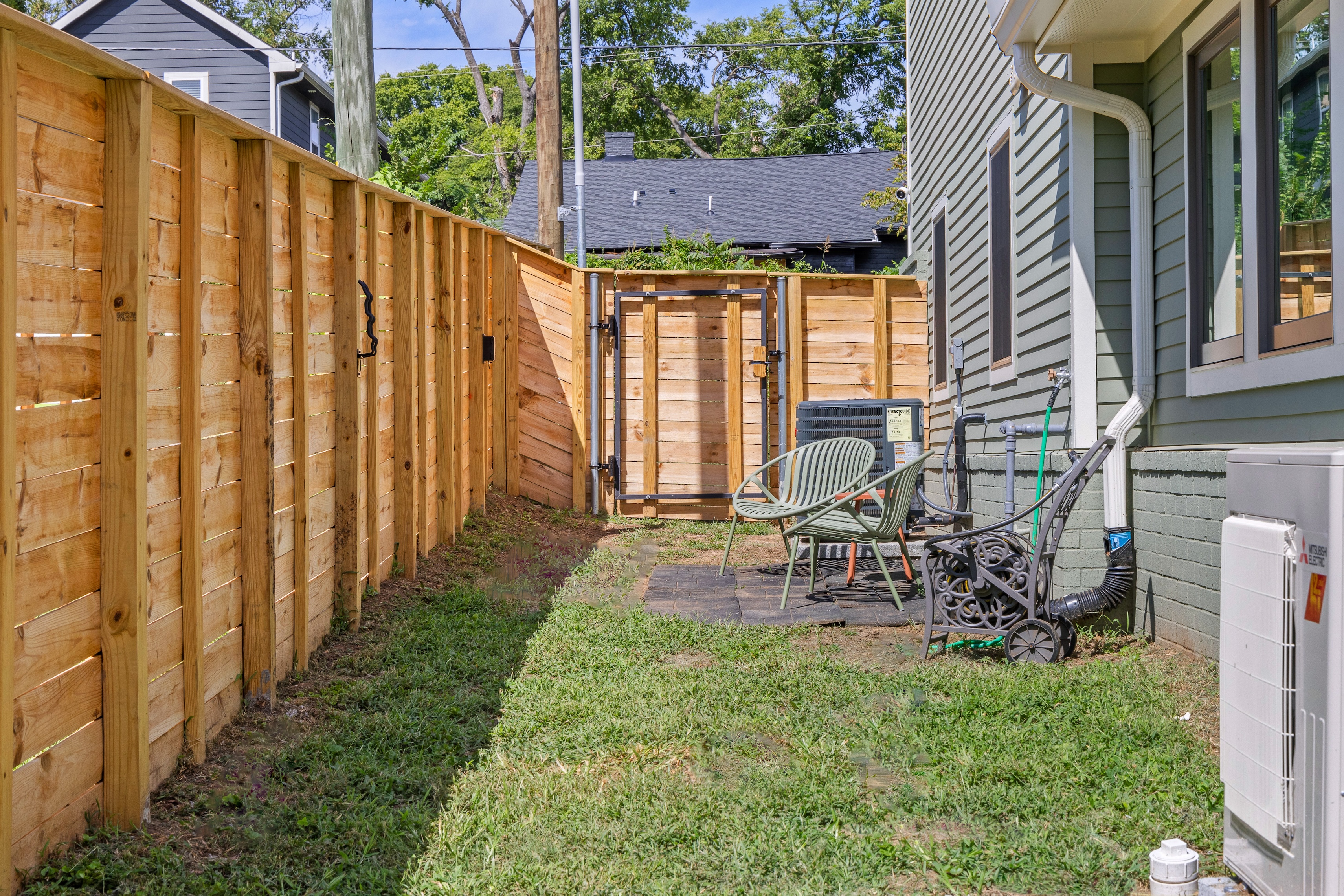 Your own personal dog run, with seating for humans and a fenced space for pup to play.