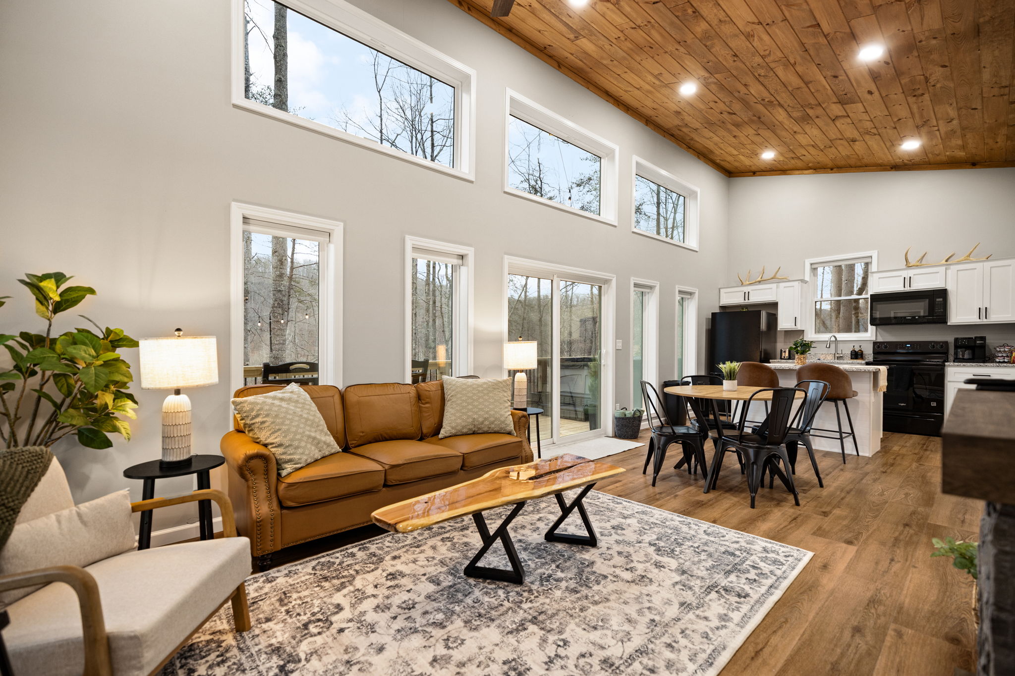 Experience a space where the walls disappear, natural light floods every corner, and nature becomes your living room decor.