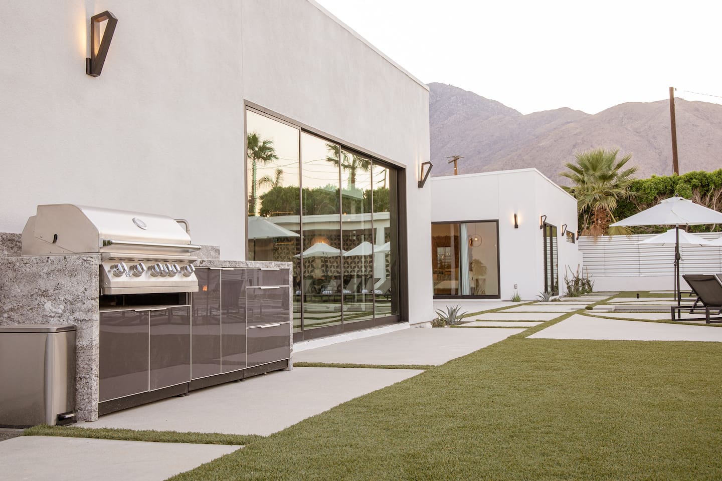 Outdoor BBQ area with sink and storage - adjacent to kitchen