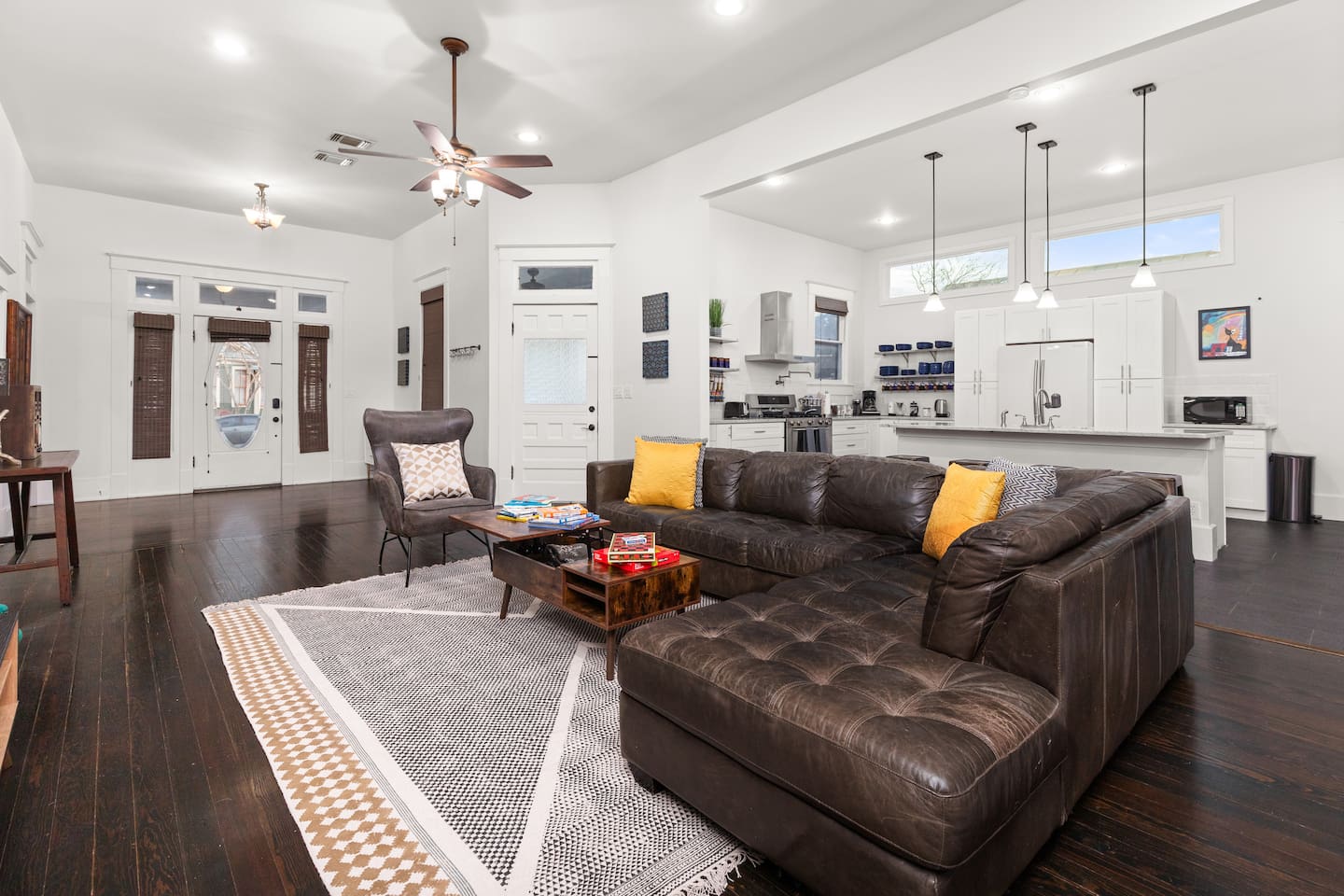 Challenge your companions to a friendly game night in our vibrant living space, where fun and relaxation are the house rules.