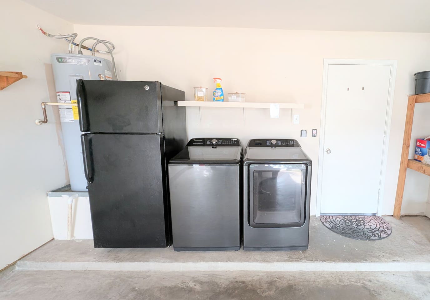 Guests have access to secondary refrigerator and freezer as well as washer and dryer in the garage. 