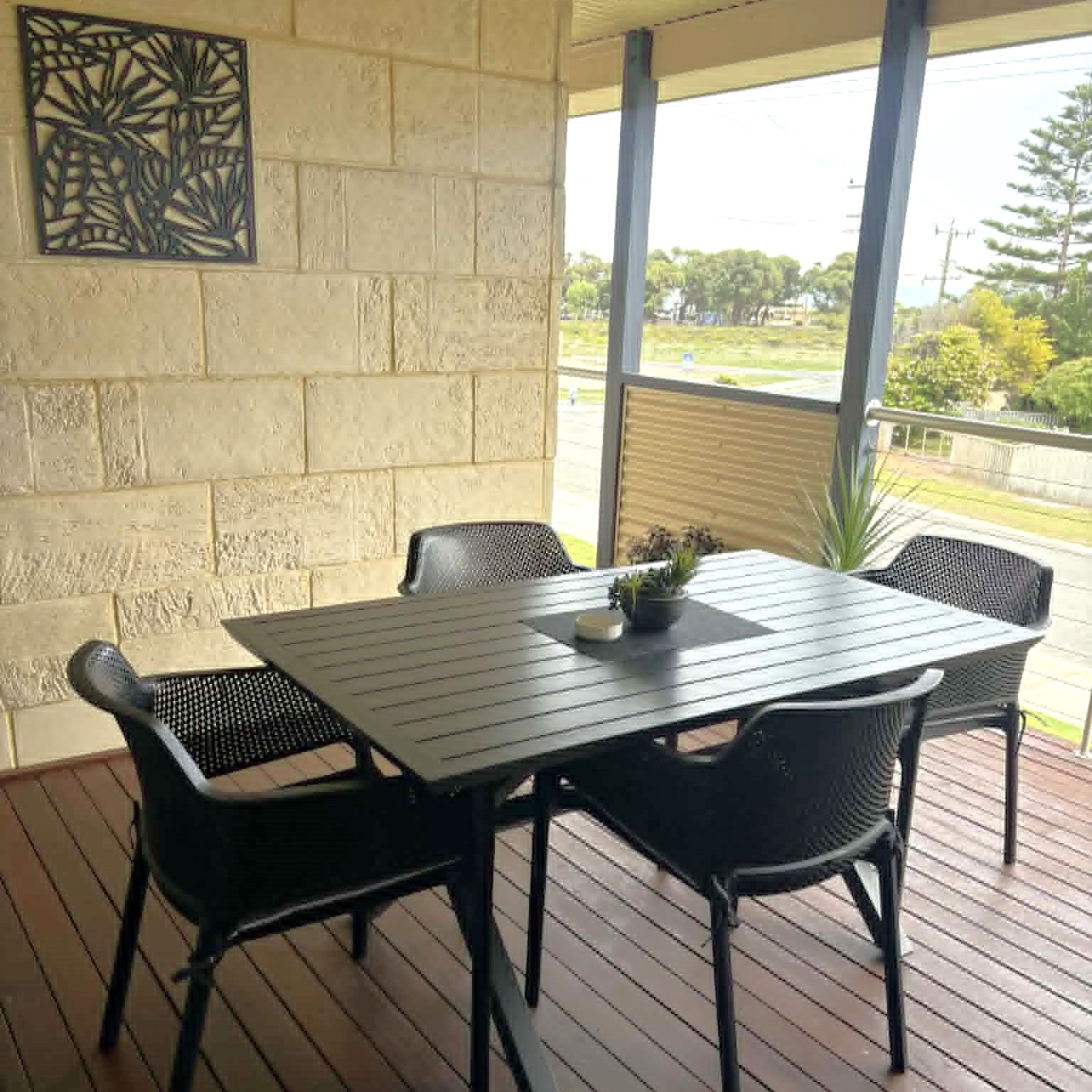 Outdoor dining on the private balcony with BBQ