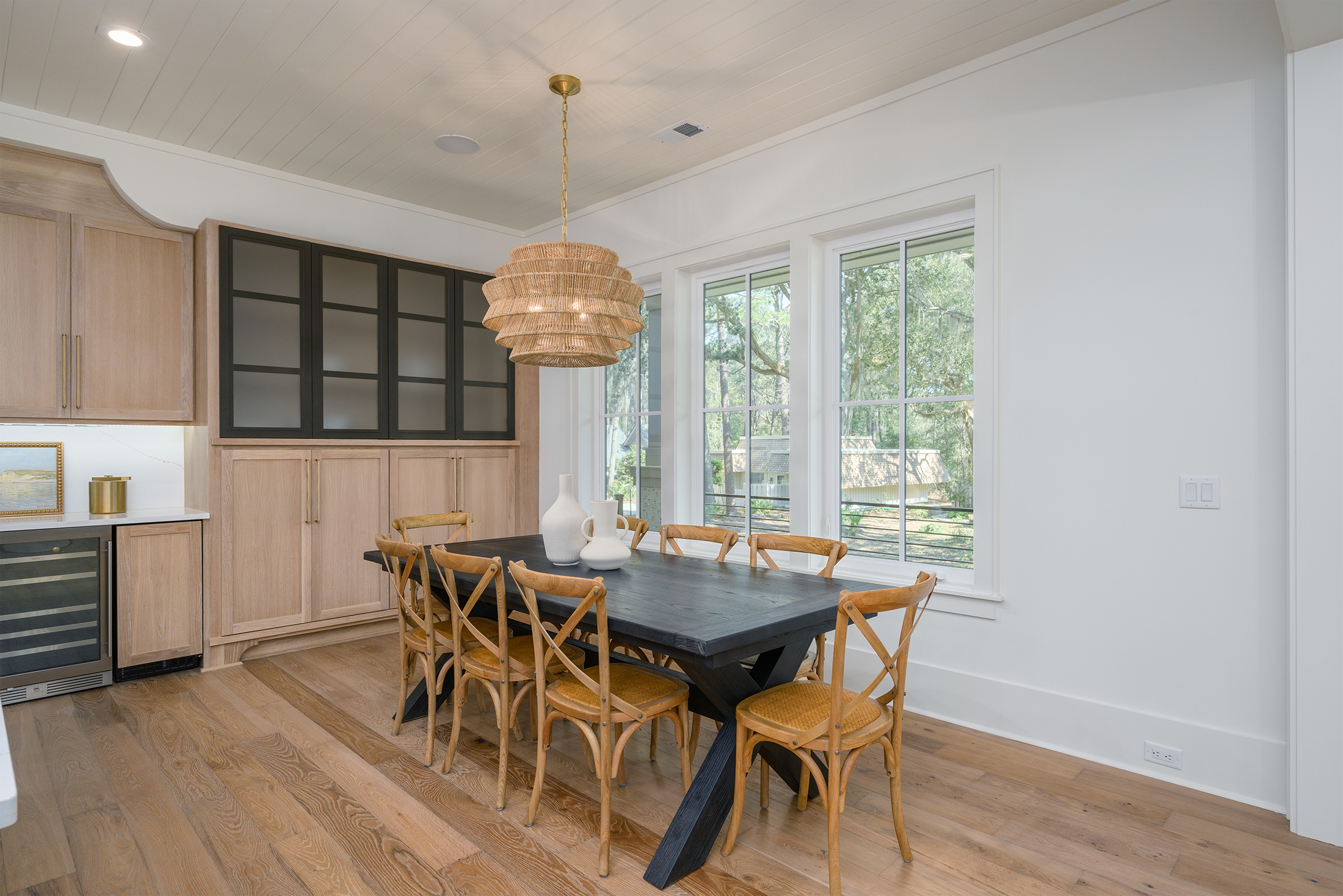 Dining area seats 8 and 3 at kitchen counter
