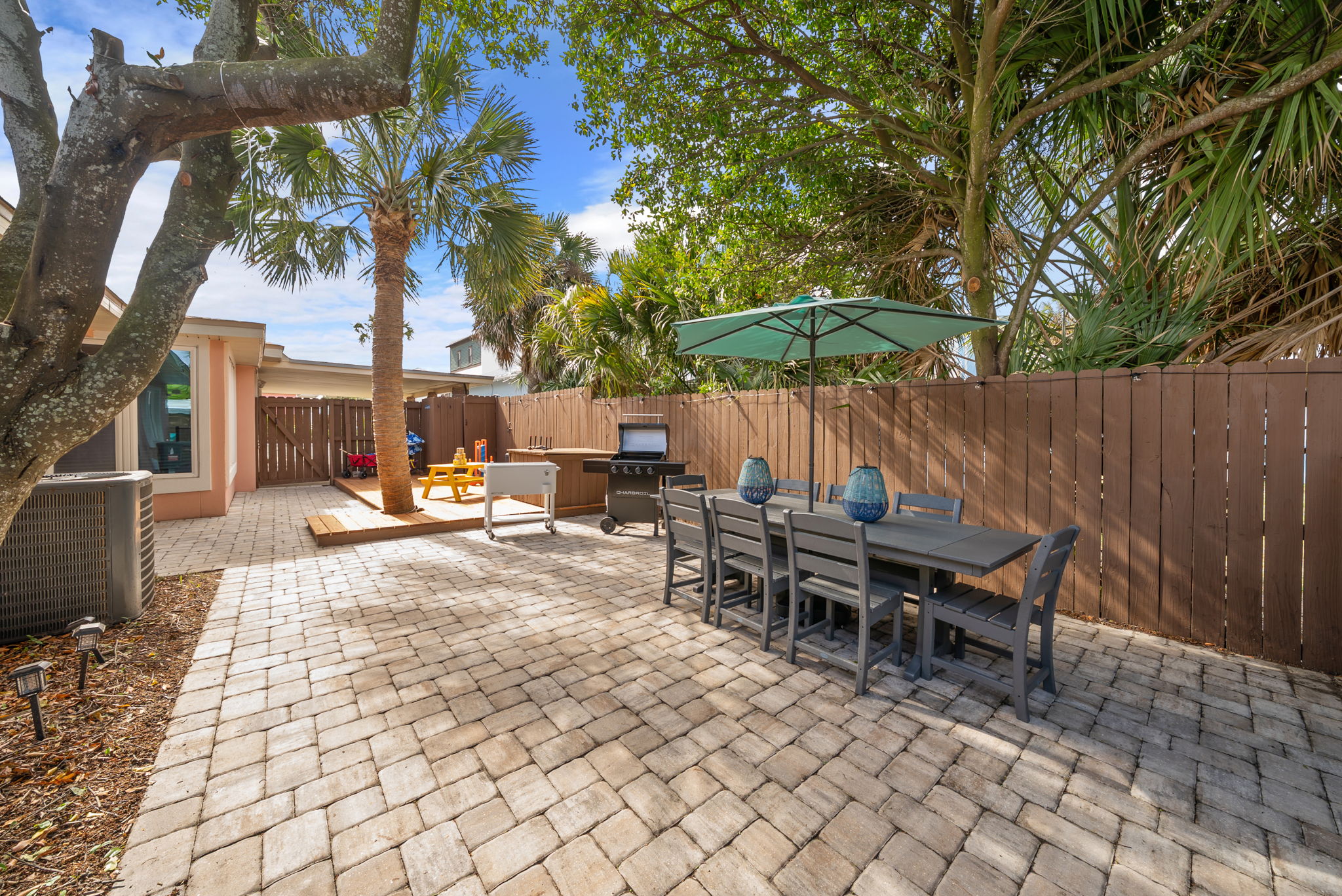 Grill, dine, and relax without moving. The patio connects your gas
grill, outdoor dining table, pool deck, and lounge seating in one seamless outdoor living zone.