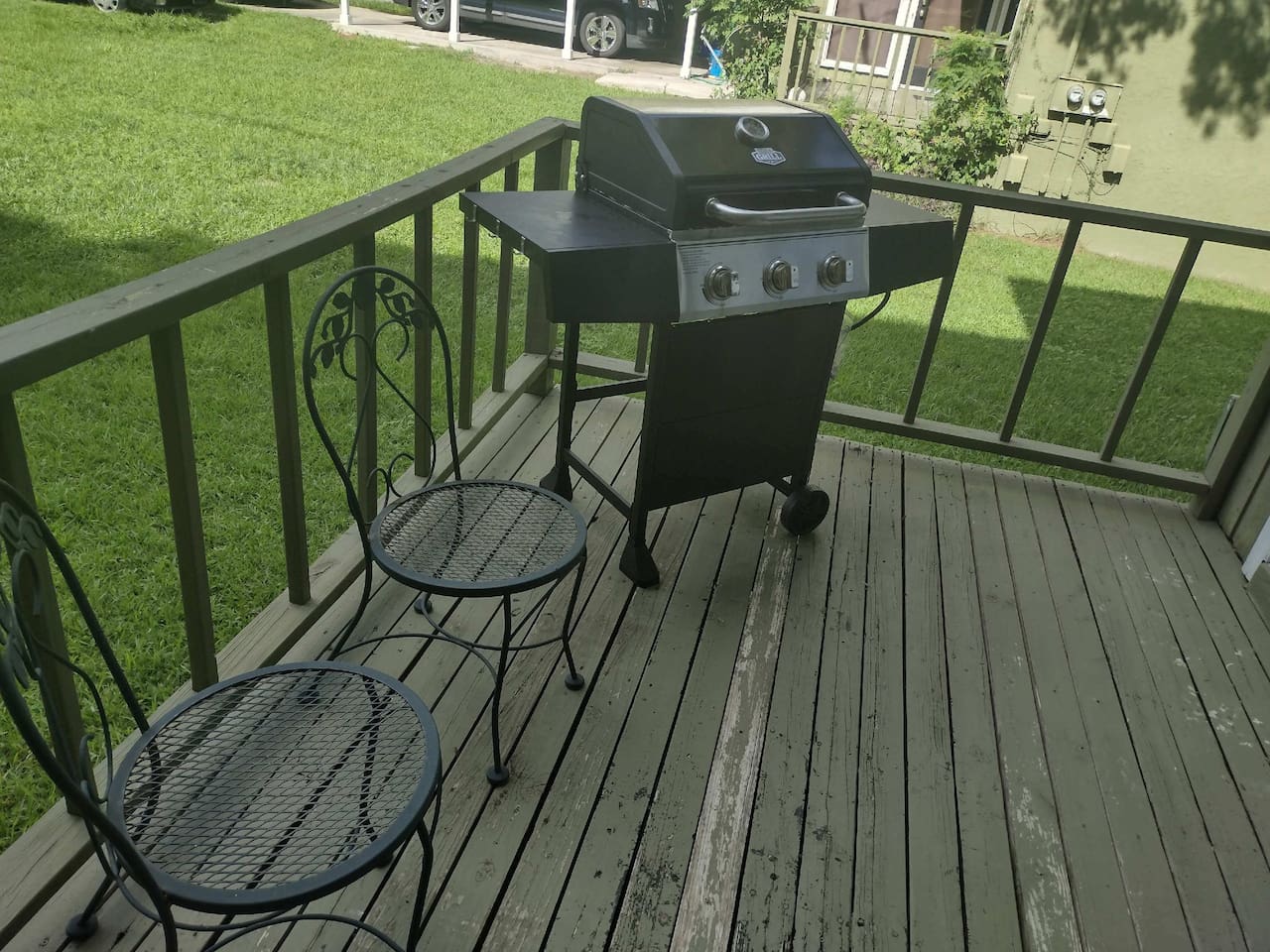 Front porch with grill and seating