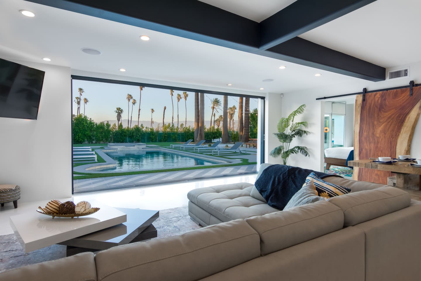 Living room with 16 foot pocket door to outside