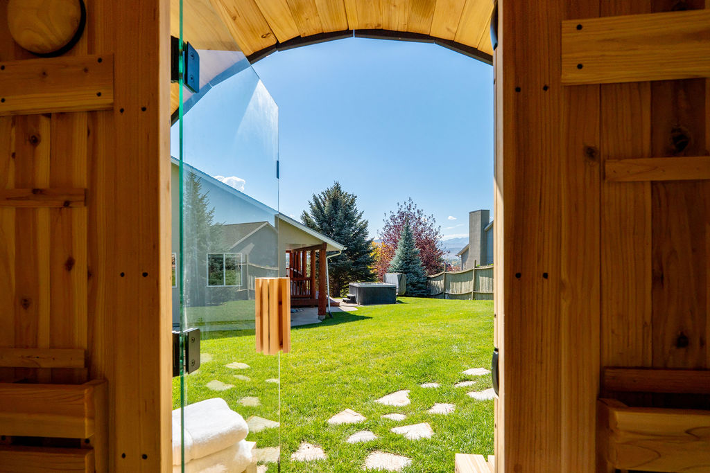 Even the views from the sauna are hard to beat. Experience the relief of a wood barrel sauna 