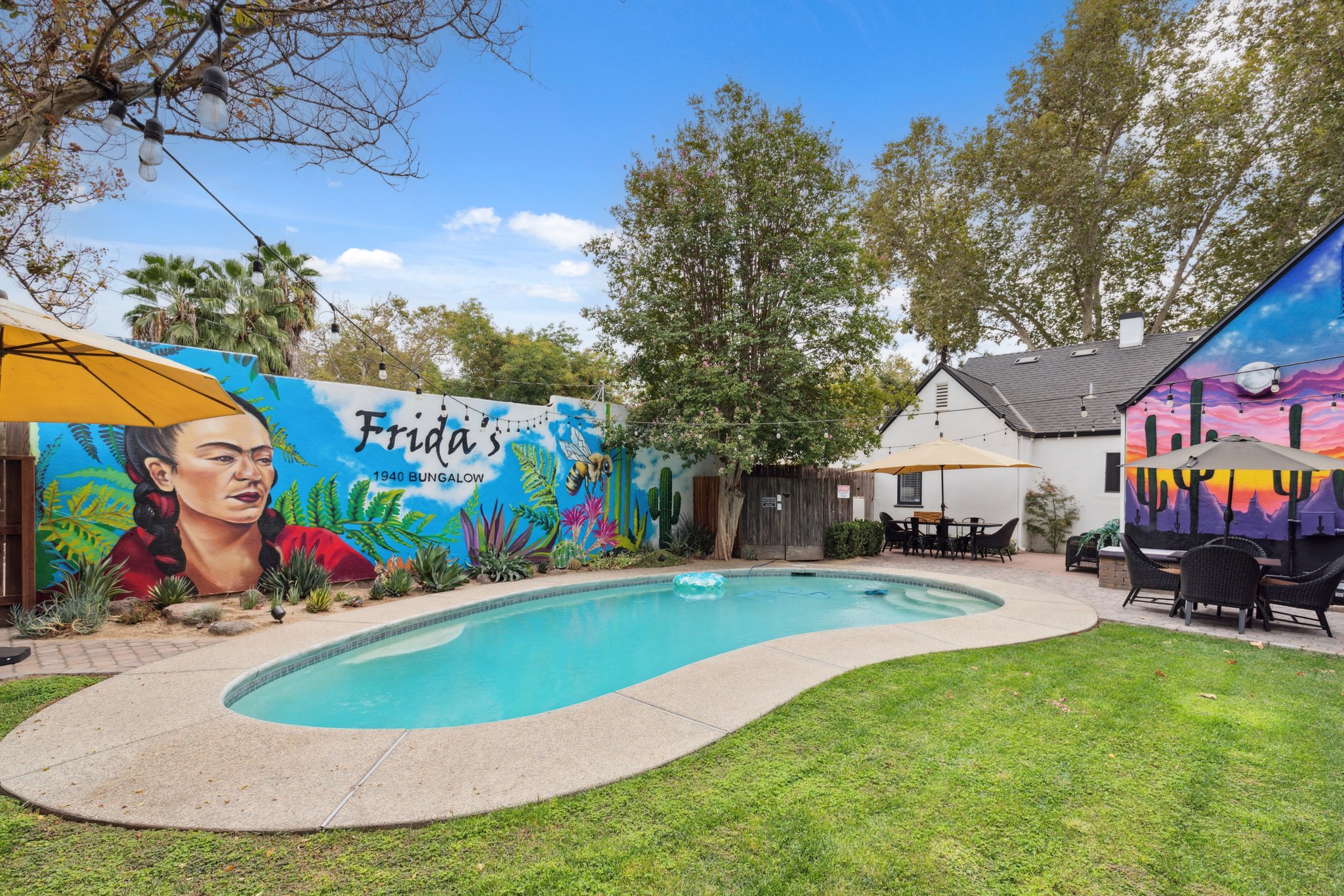 Private pool surrounded by murals